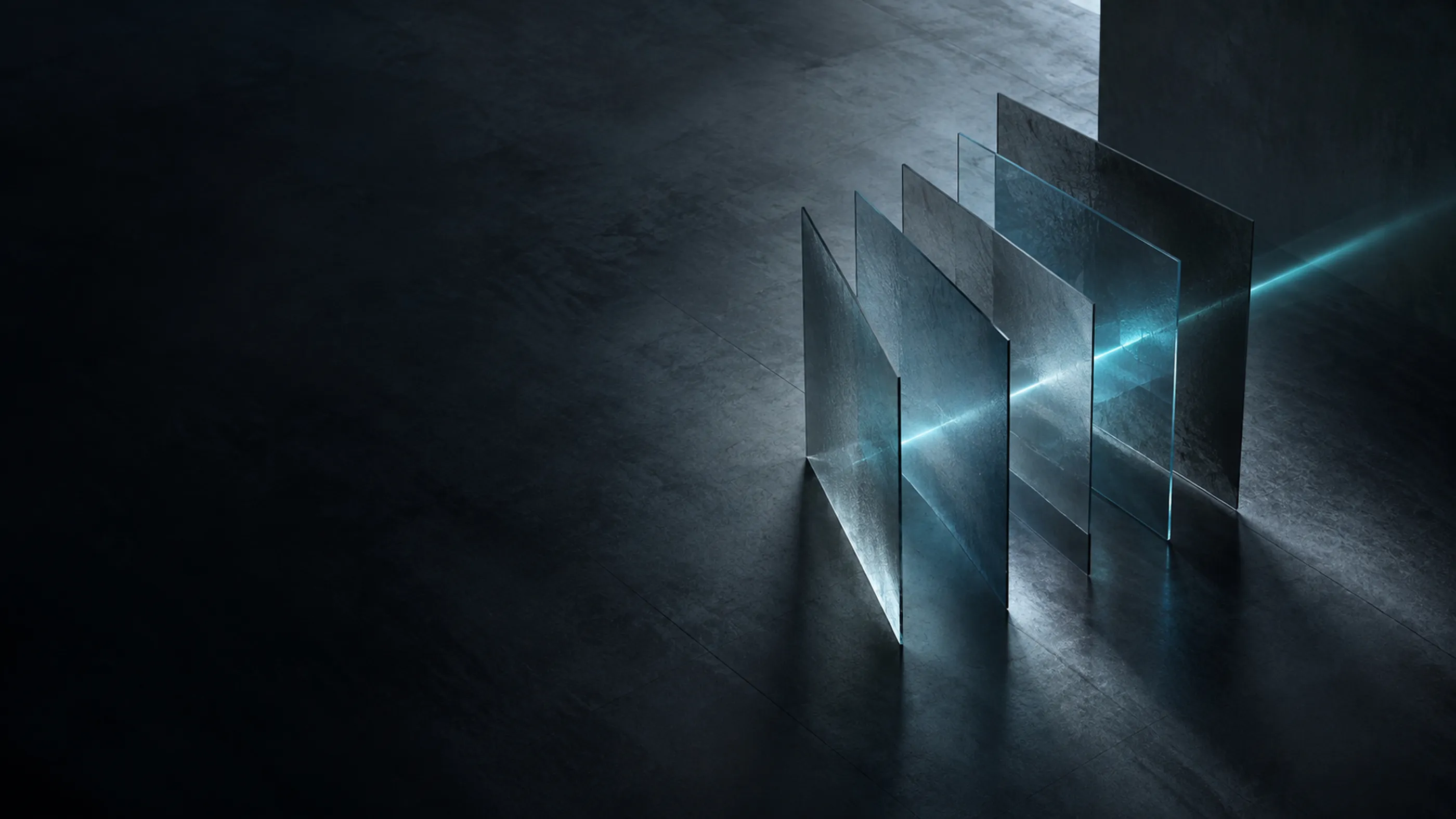 Glass panes standing in a row, a teal beam of light passing through them